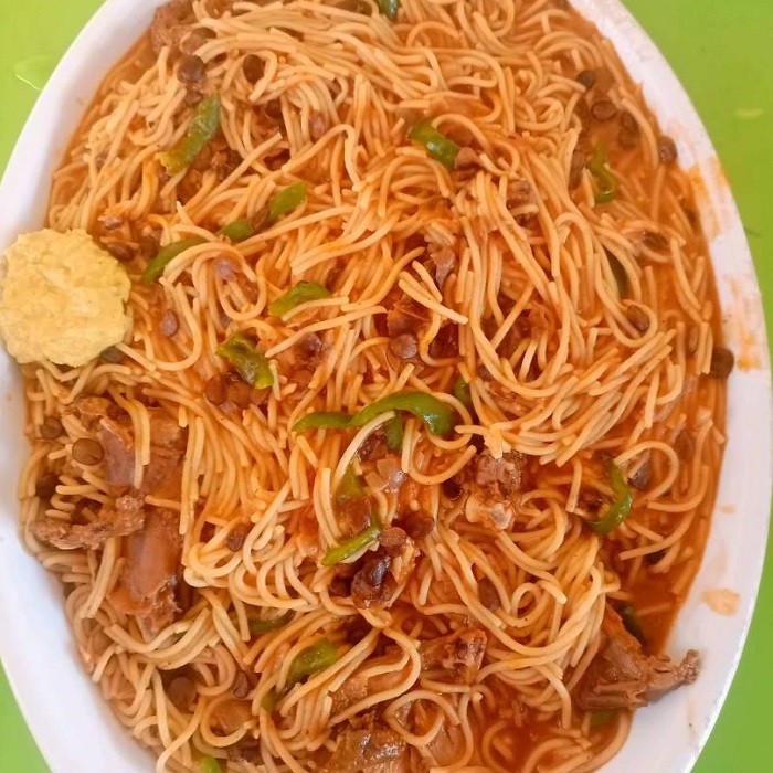 Spaghetti Soumbala accompagné de poulet